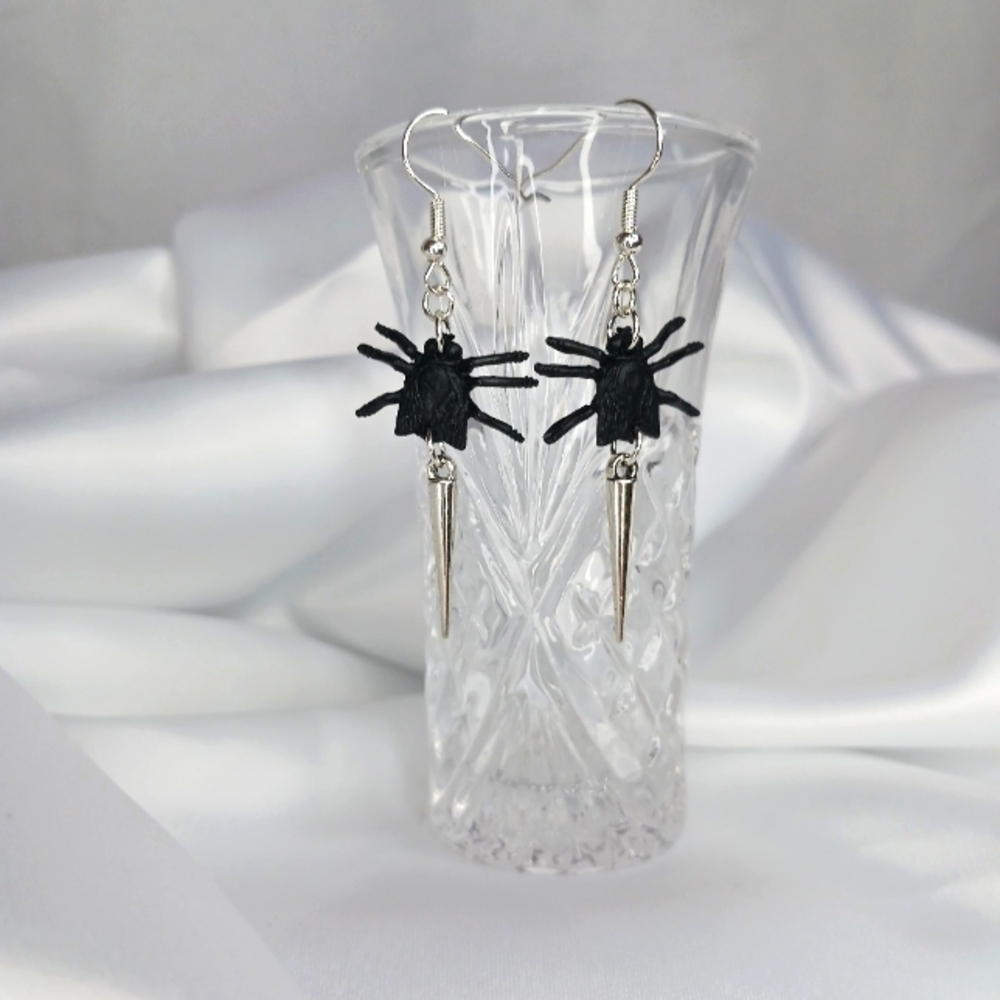 Silver Spikes on Black Fly Earrings.